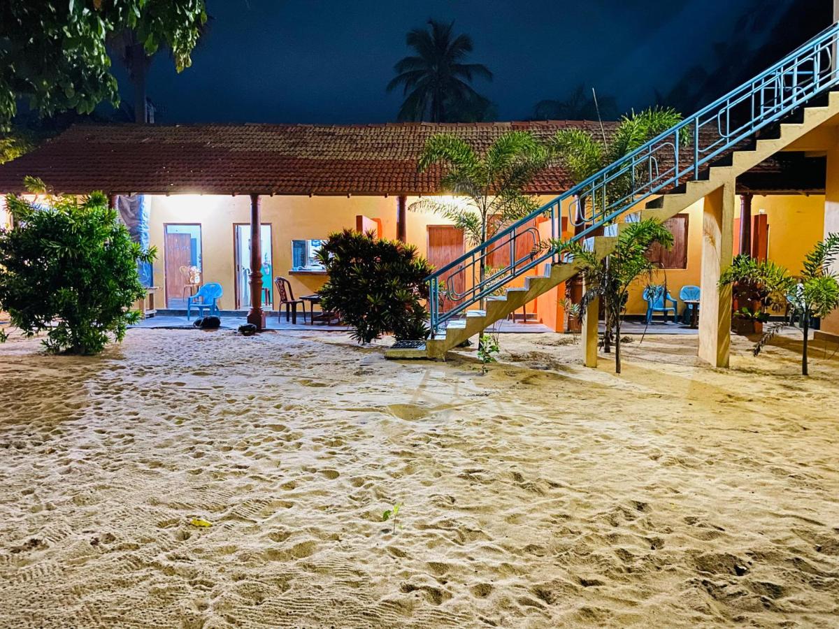 Beach villa with external staircase leading to the sea view balcony